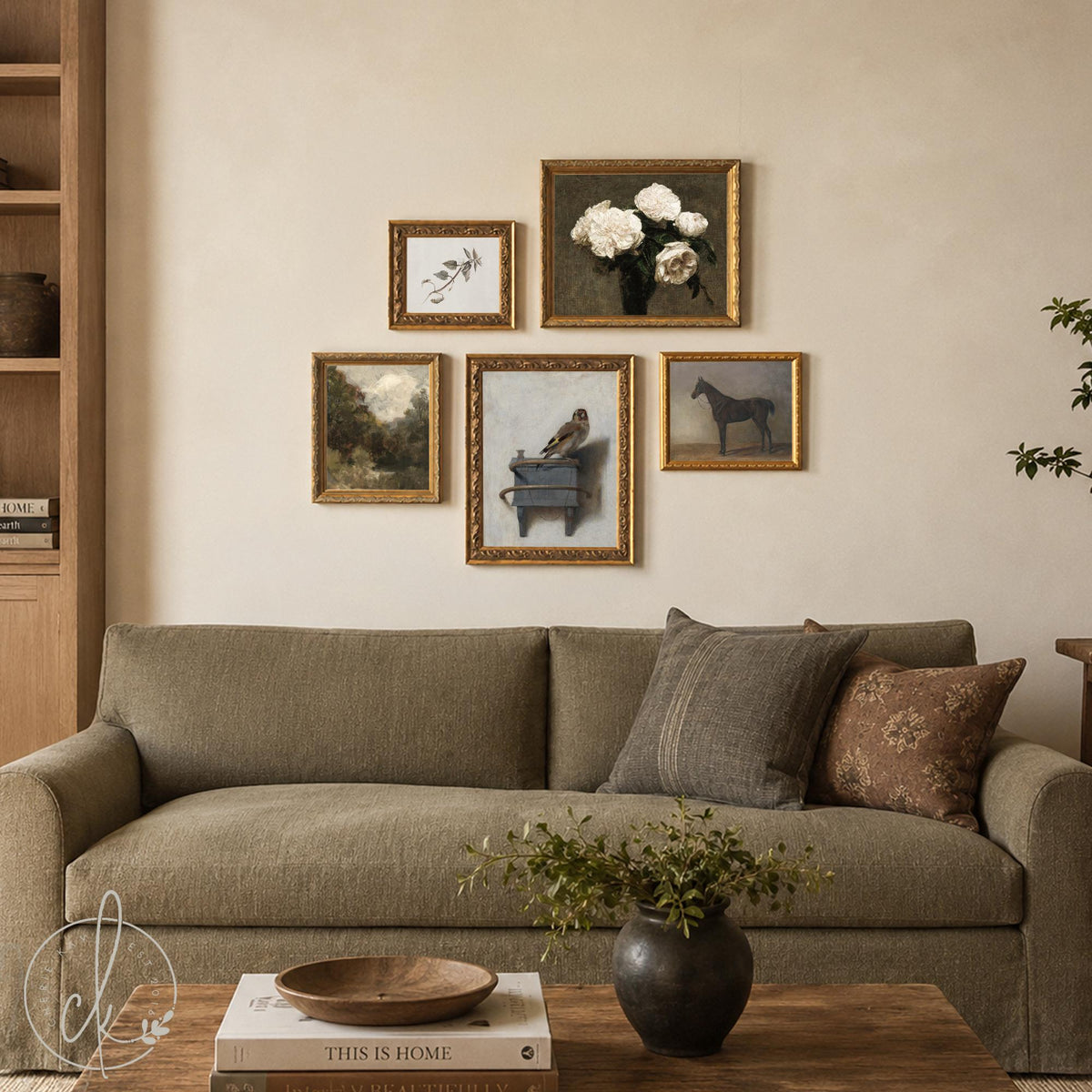 Wall collage of five ornate gold framed prints with a goldfinch, white roses, a horse and a landscape over a green couch