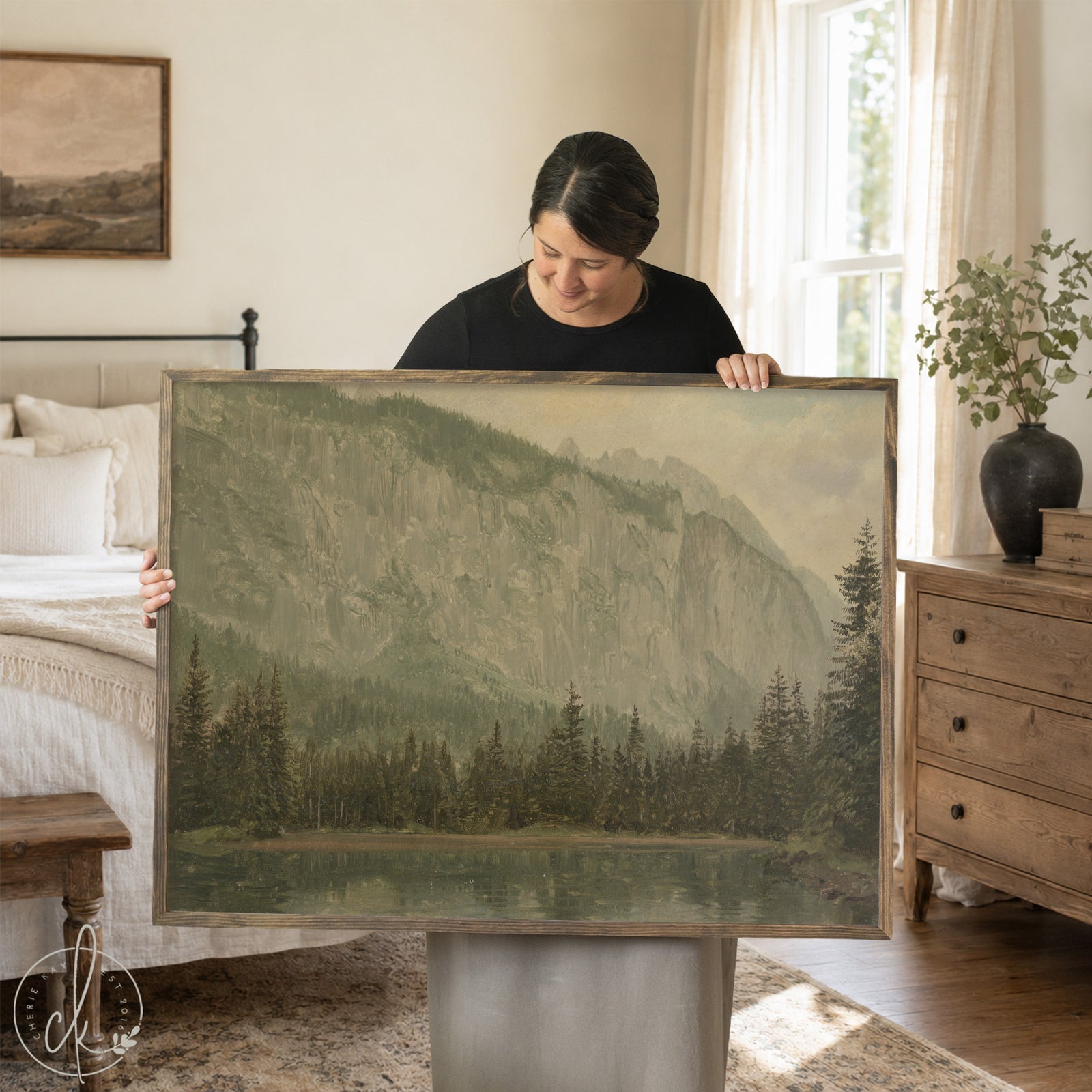 Lake and mountains painting in gold frame showing alpine landscape with pine trees reflected in calm water, vintage oil painting style artwork for wall decor