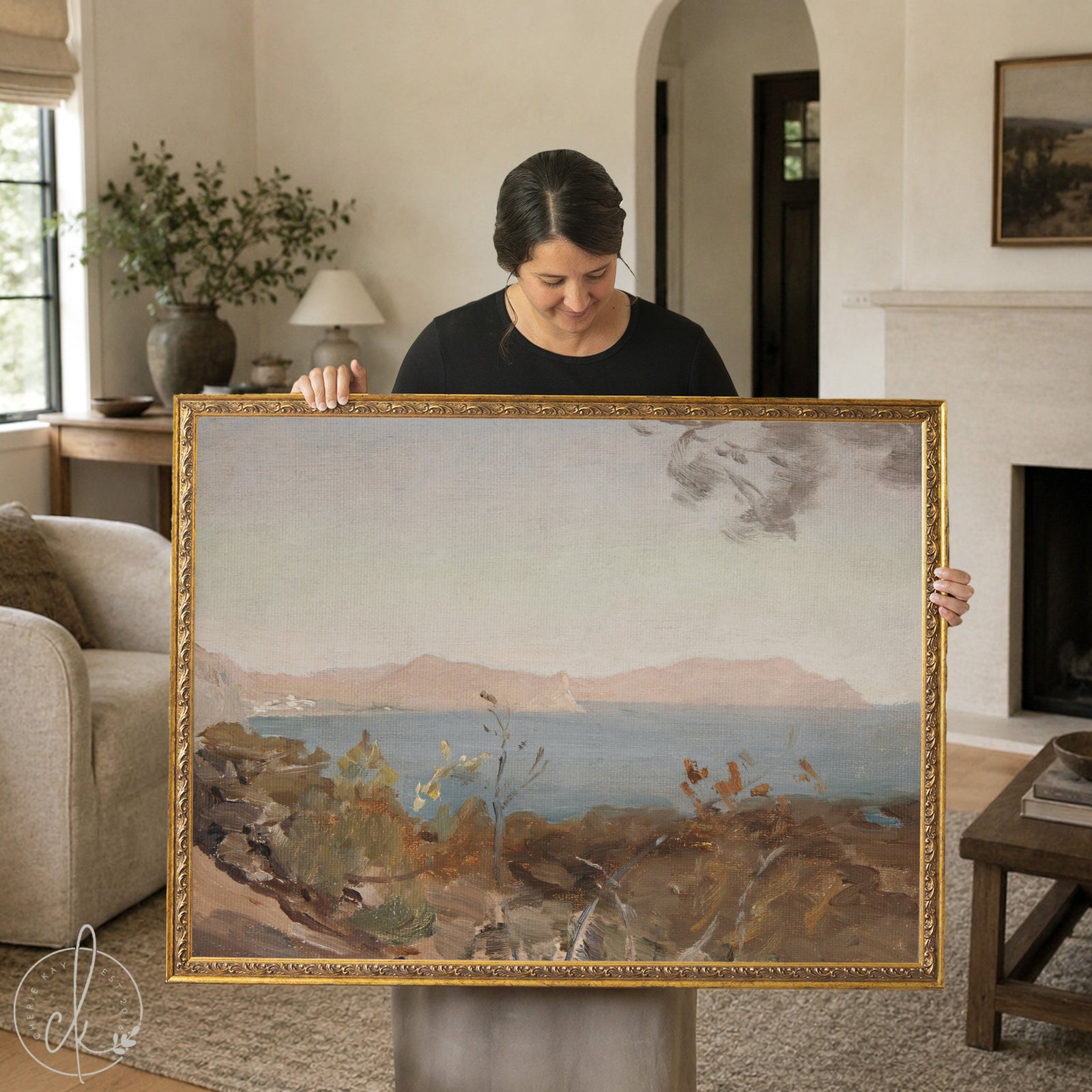 Vintage coastal wall art featuring Mediterranean seascape with rocky shoreline and distant mountains in ornate gold frame
