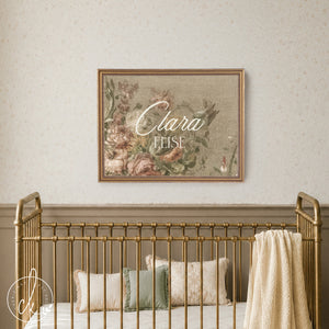 Victorian Nursery personalized name sign for Clara in gold frame over a crib with antique floral decor.