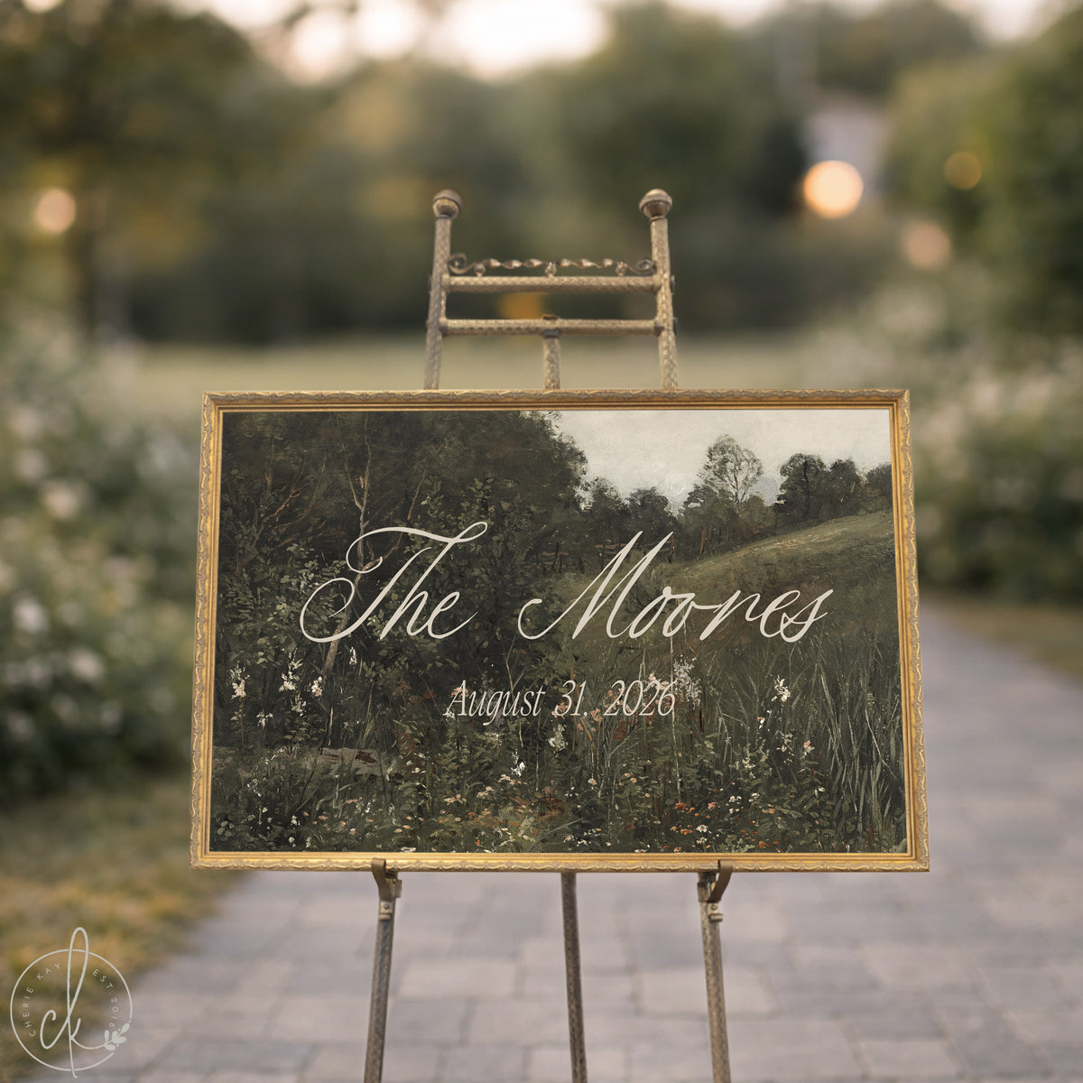 Vintage wedding sign with gold frame and personalized names, perfect for ceremony or home decor.
