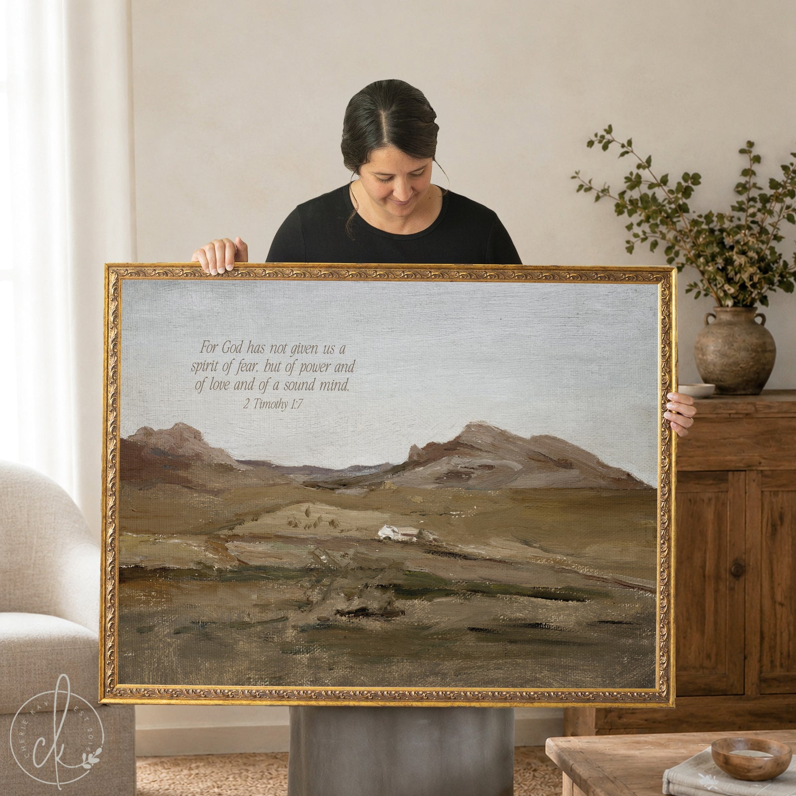 Large scripture wall art featuring a muted mountain landscape with 2 Timothy 1:7 in a gold ornate frame