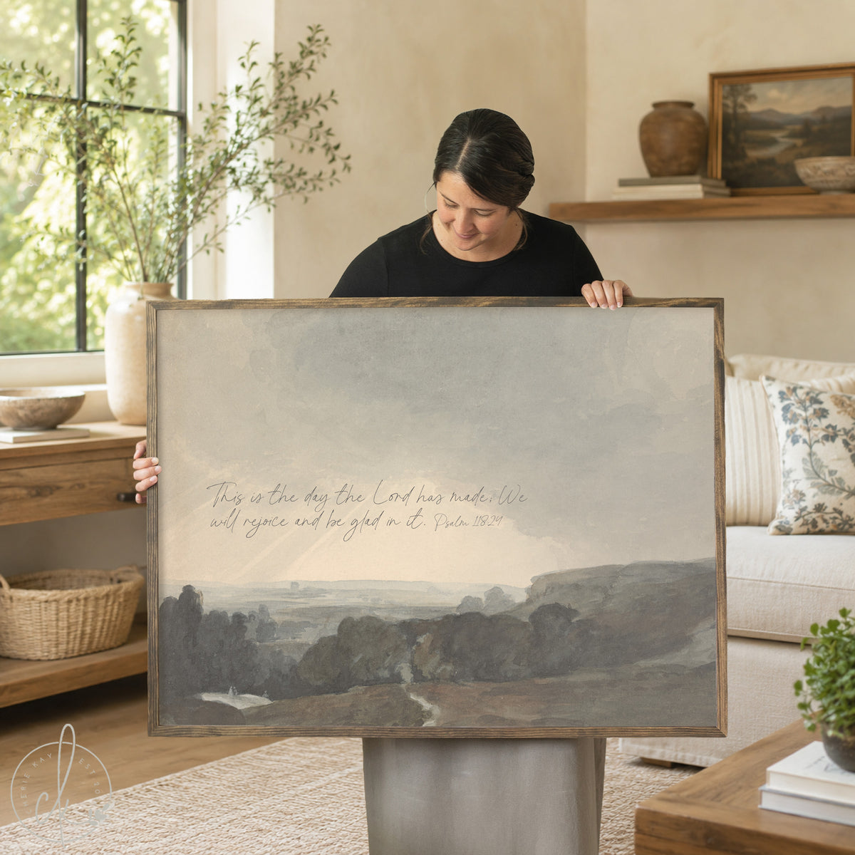 Framed landscape art with Psalm 118:24 verse over a soft countryside scene.
