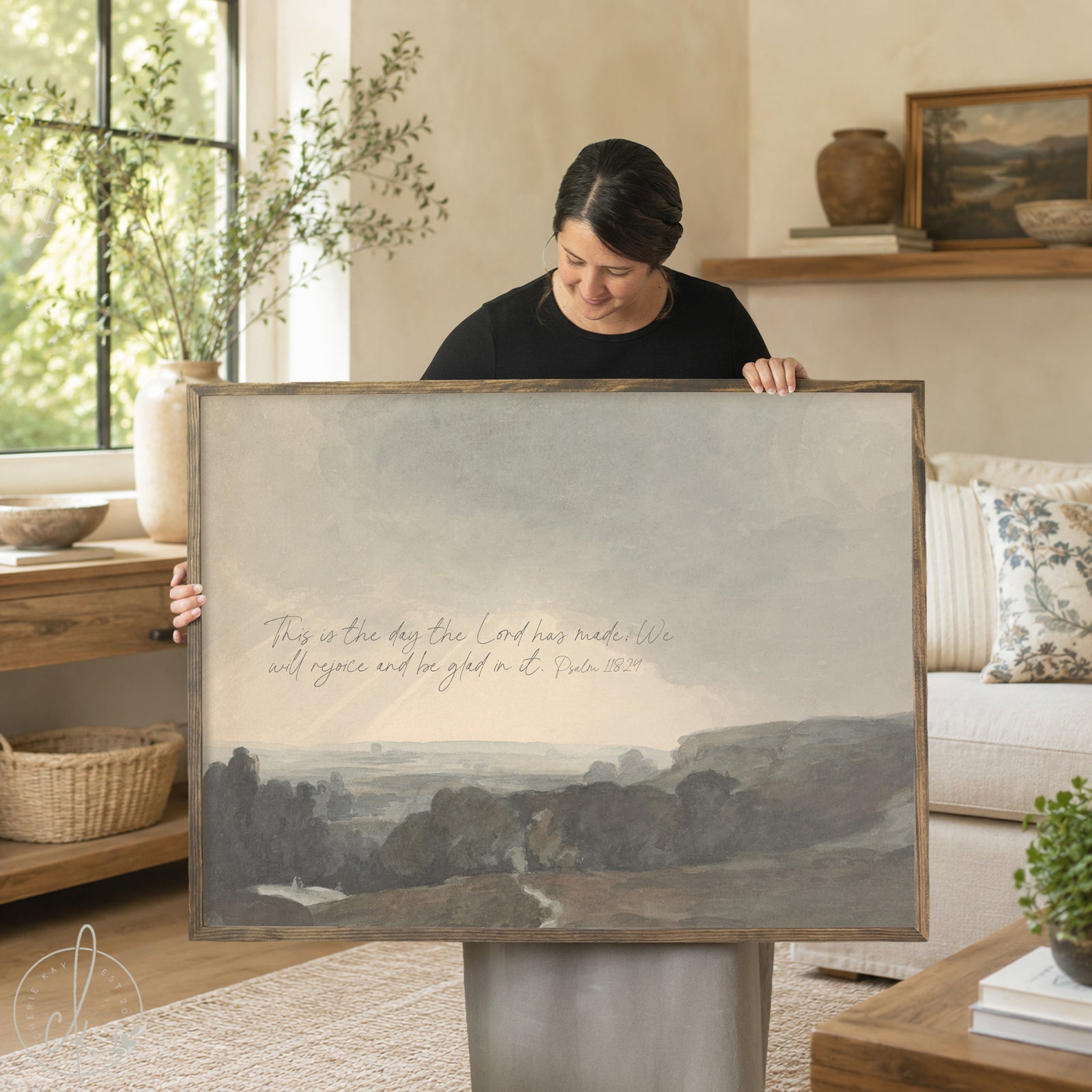 Framed landscape art with Psalm 118:24 verse over a soft countryside scene.