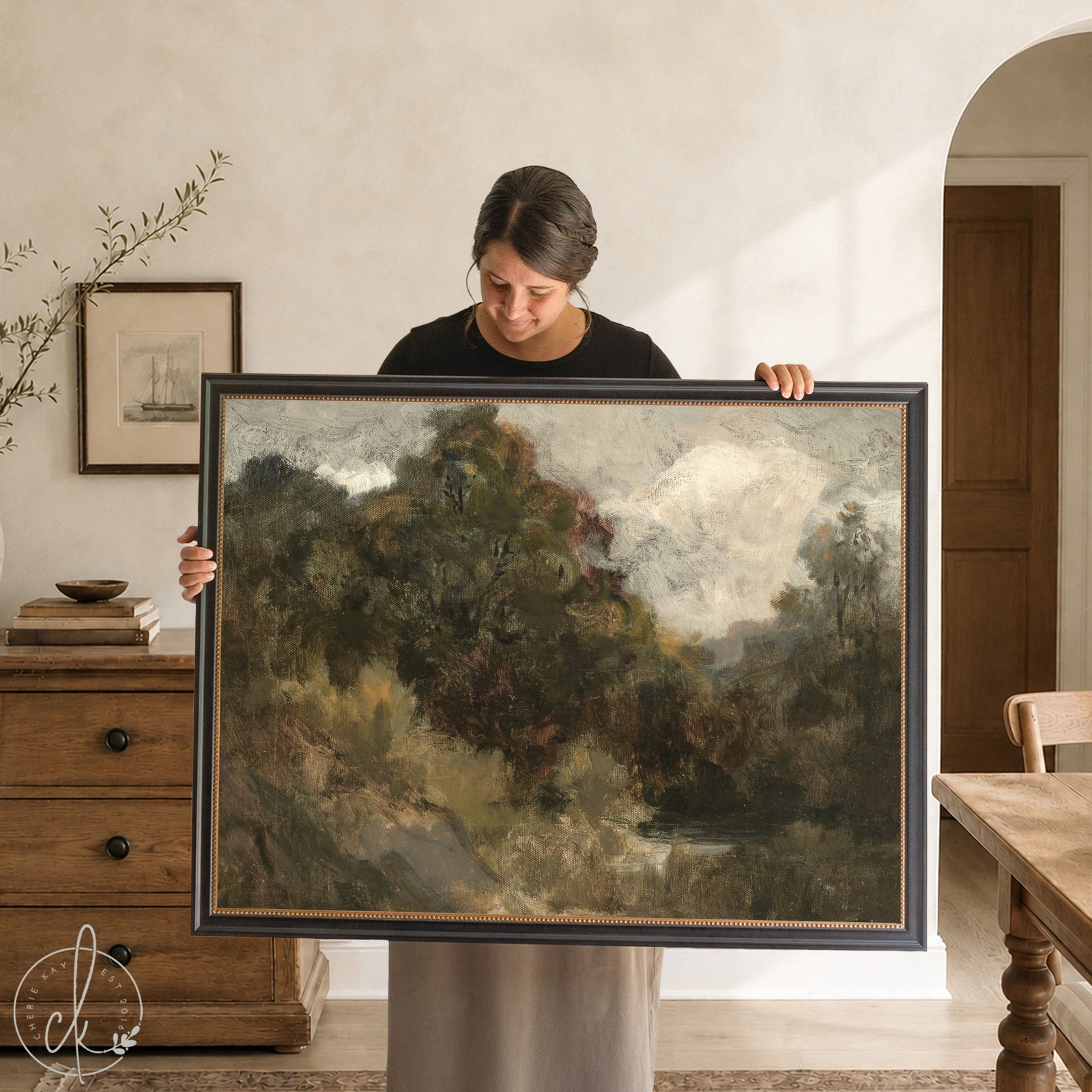 Framed impressionist artwork featuring a moody vintage landscape in ornate gold or black frame, ideal for large wall art in living room or entryway