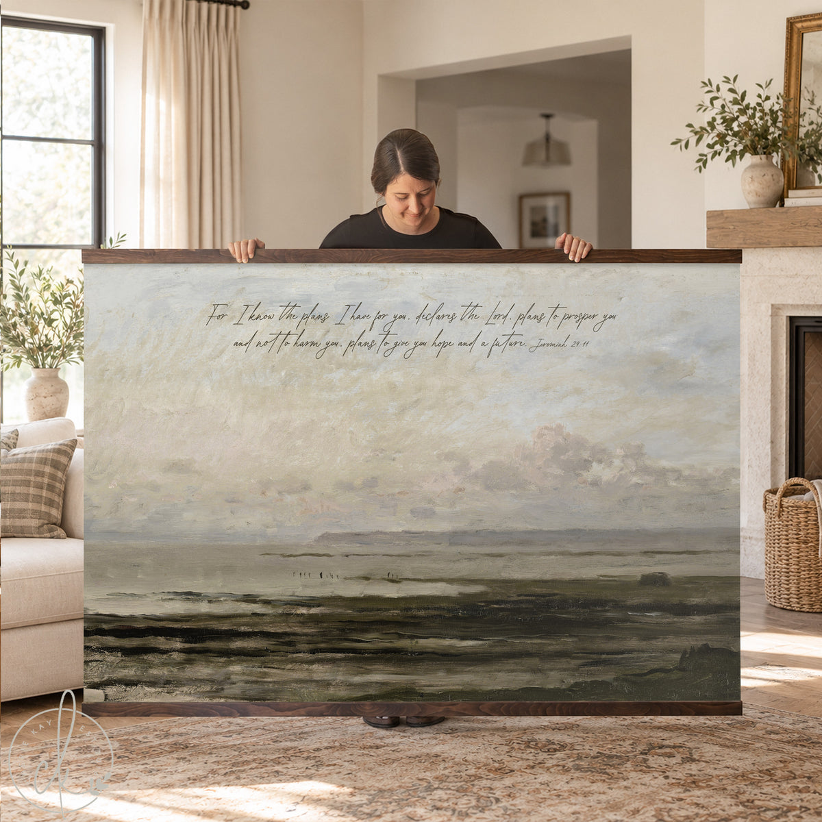 A large illustrated tapestry with a serene landscape scene, featuring rolling hills, soft earthy tones, and detailed artwork that resembles a peaceful countryside vista, hung on a wall for display.