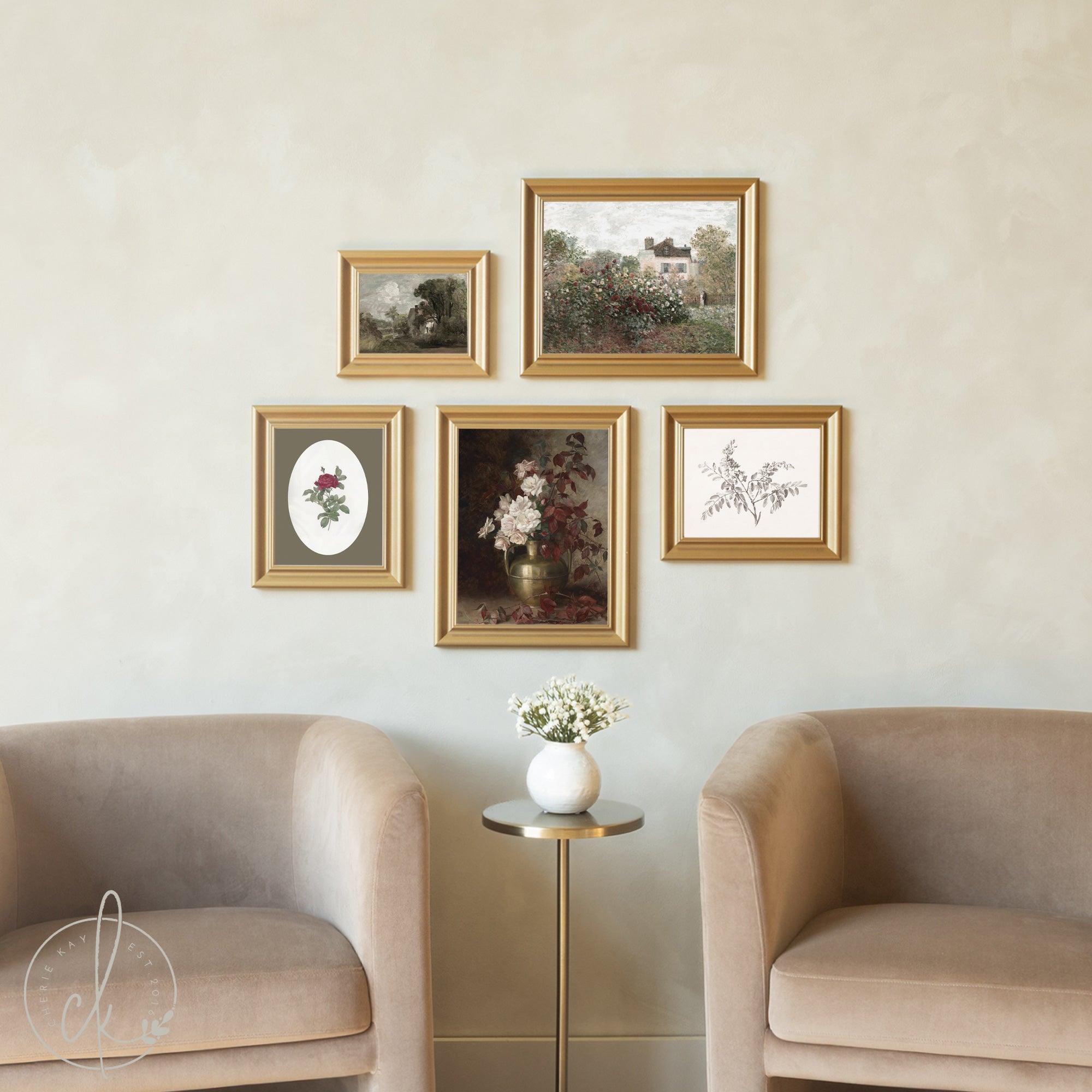 Five elegantly framed artworks in matching gold frames create a refined gallery wall above two taupe velvet armchairs, featuring a romantic cottage garden scene, classic landscape, floral still life centerpiece, and delicate botanical prints in an artfully arranged composition.RetryClaude can make mistakes. Please double-check responses.